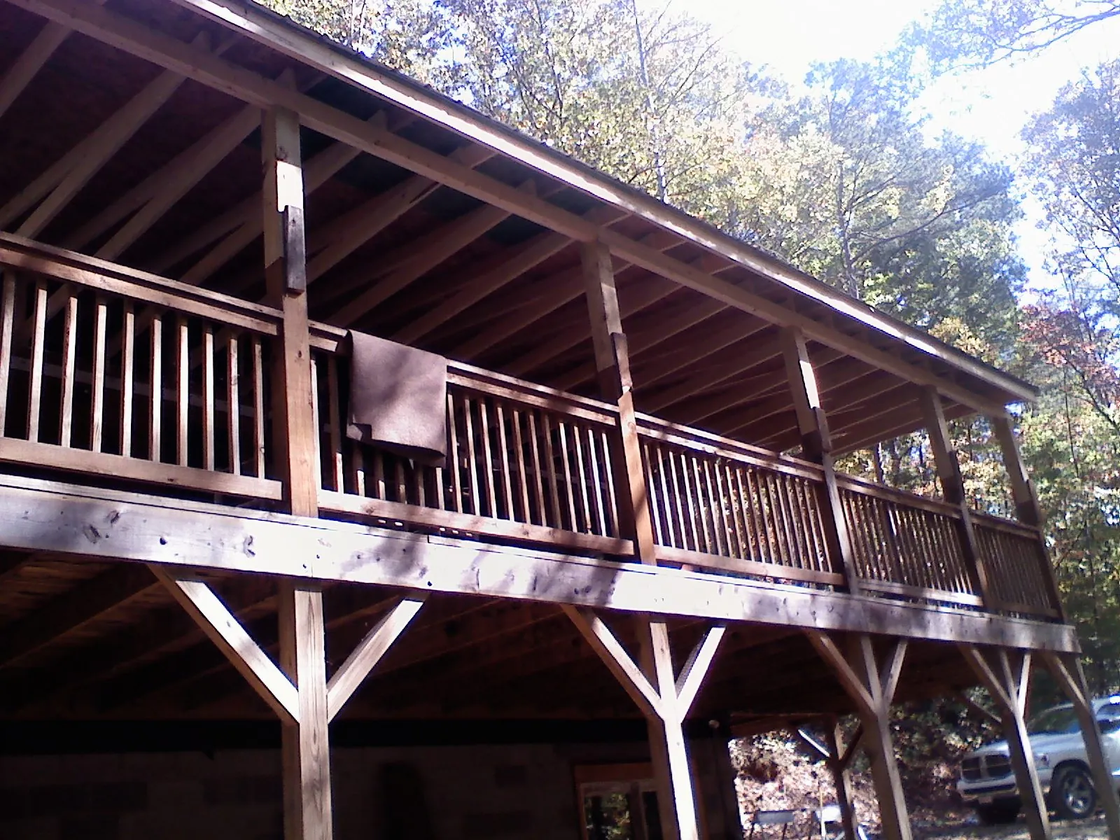 Timber framing under a new elevated porch and deck — Roof Leak Repair in Edelstein by Roofing Brothers